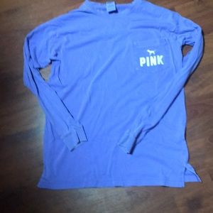 A “pink” long sleeve shirt.
